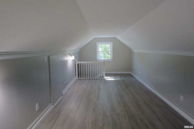 621 E Oglesby, Salem, IL 62881 - additional living space with wood finished floors, vaulted ceiling, and baseboards