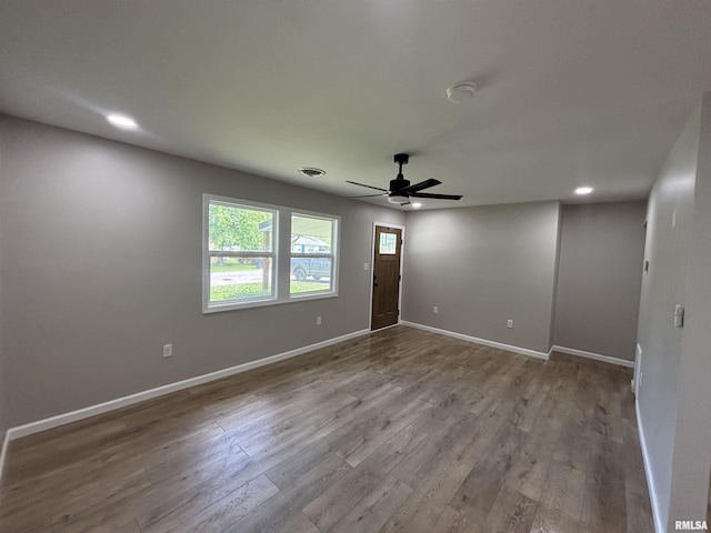 116 Lindsey Ave, Metropolis, IL 62960 - unfurnished room featuring a ceiling fan, a smoke detector, wood finished floors, recessed lighting, and baseboards