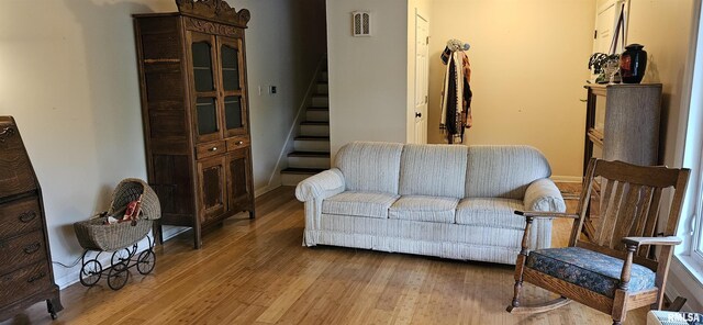 1608 W Briarwood Dr, Carbondale, IL 62901 - living room featuring wood finished floors and stairs