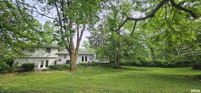 1608 W Briarwood Dr, Carbondale, IL 62901 - view of grassy yard featuring french doors