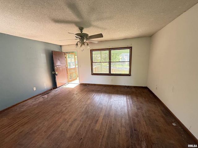 102 Stable Dr, Carterville, IL 62918 - unfurnished room with wood finished floors, ceiling fan, a textured ceiling, and baseboards