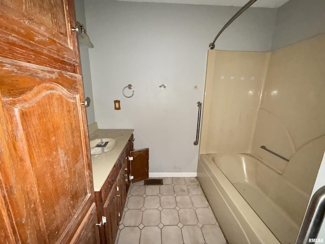 102 Stable Dr, Carterville, IL 62918 - bathroom featuring shower / bathtub combination, vanity, and baseboards
