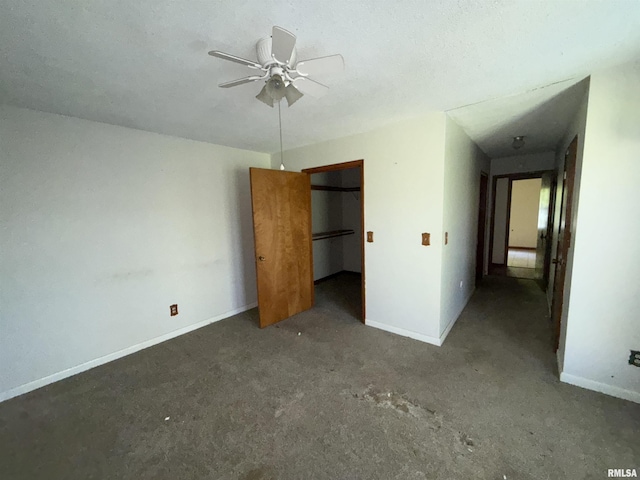 102 Stable Dr, Carterville, IL 62918 - unfurnished bedroom with baseboards, carpet flooring, a closet, and ceiling fan
