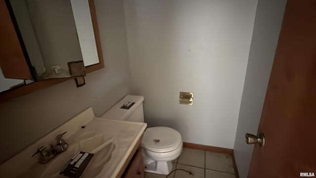 102 Stable Dr, Carterville, IL 62918 - bathroom featuring toilet, vanity, tile patterned floors, and baseboards