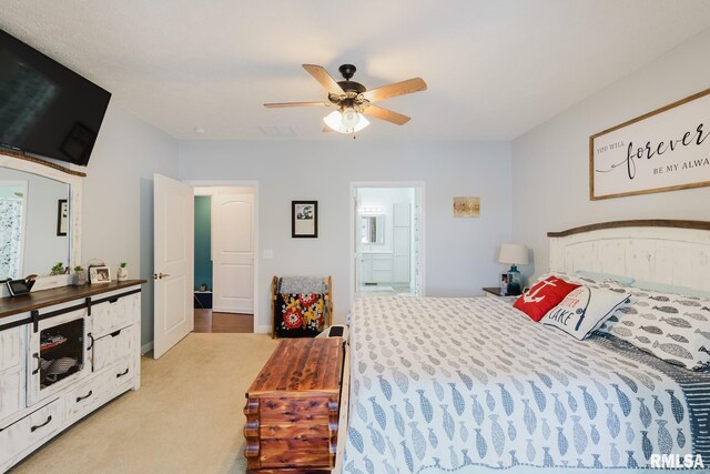 11782 Driftwood Dr, Marion, IL 62959 - bedroom with light carpet, ensuite bath, and ceiling fan