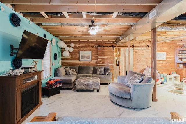 11782 Driftwood Dr, Marion, IL 62959 - living area featuring wood walls, ceiling fan, and marble finish floors