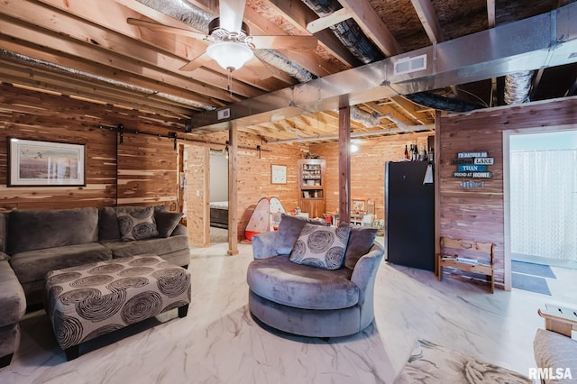 11782 Driftwood Dr, Marion, IL 62959 - living area with wooden walls, a barn door, a ceiling fan, and marble finish flooring