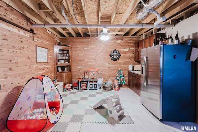 11782 Driftwood Dr, Marion, IL 62959 - rec room with wood walls and a ceiling fan