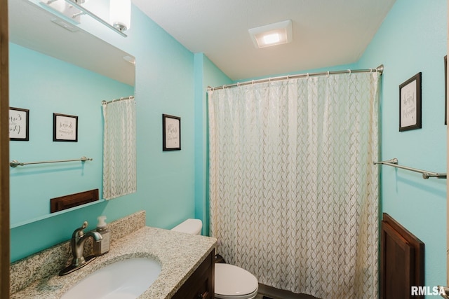 11782 Driftwood Dr, Marion, IL 62959 - bathroom with vanity, toilet, and curtained shower