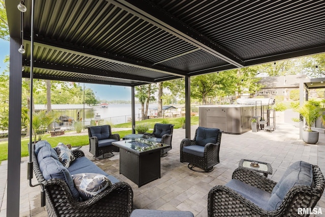 11782 Driftwood Dr, Marion, IL 62959 - fenced backyard with an outdoor living space with a fire pit, a water view, and a patio area