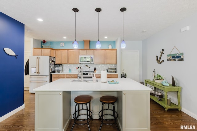 11782 Driftwood Dr, Marion, IL 62959 - kitchen featuring stainless steel microwave, white refrigerator with ice dispenser, light countertops, dark wood-style flooring, and recessed lighting