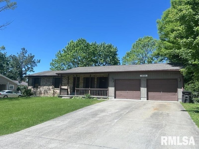 1408 Bobette Ln, Carbondale, IL 62901 - ranch-style house with a garage, concrete driveway, a front lawn, and a porch