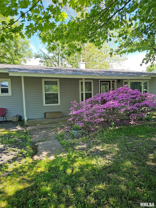 17 Roseclair St, Centralia, IL 62801 - view of front of property with a chimney