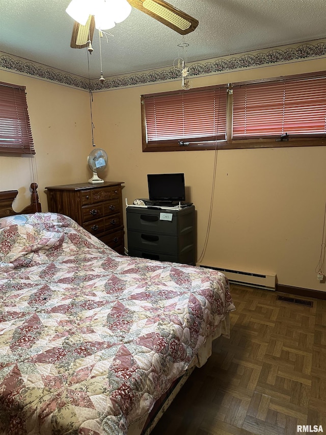 1480 Hemlock Rd, Duquoin, IL 62832 - bedroom featuring baseboard heating and ceiling fan