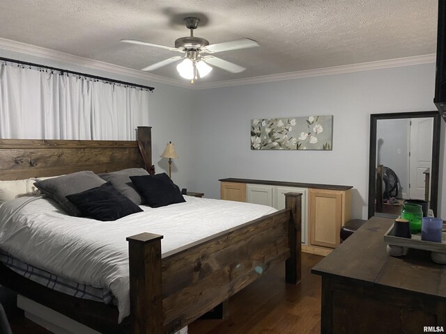 1640 Pleasant Ridge Rd, Vienna, IL 62995 - bedroom with crown molding, dark wood-type flooring, a textured ceiling, and ceiling fan