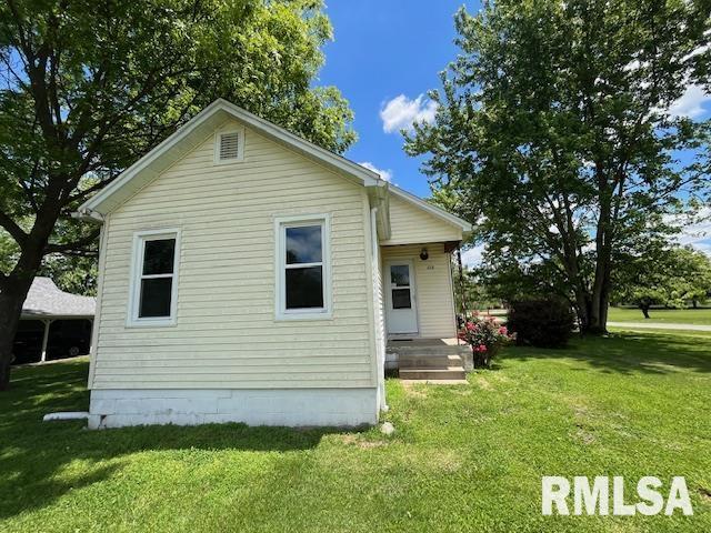 475 Holt St, Vergennes, IL 62994 - rear view of property with a yard