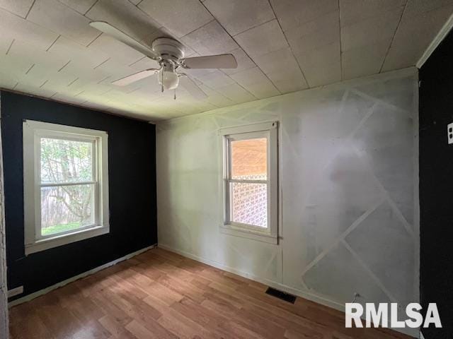 475 Holt St, Vergennes, IL 62994 - spare room featuring light wood finished floors and a ceiling fan