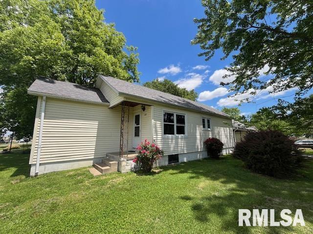 475 Holt St, Vergennes, IL 62994 - rear view of property with a yard