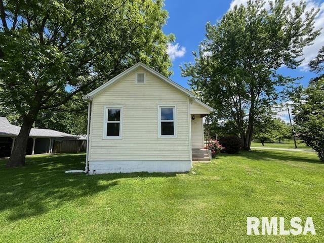 475 Holt St, Vergennes, IL 62994 - view of side of property featuring a lawn