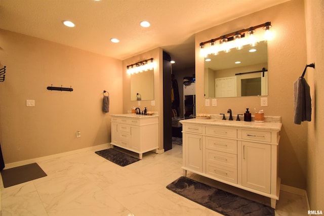 2704 Jamison Blvd, Mount Vernon, IL 62864 - full bath with two vanities, recessed lighting, baseboards, and marble finish flooring