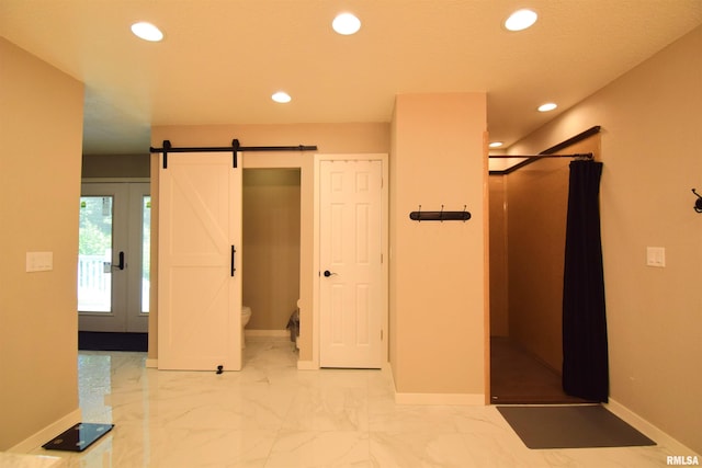 2704 Jamison Blvd, Mount Vernon, IL 62864 - corridor with baseboards, recessed lighting, a barn door, and light marble finish floors