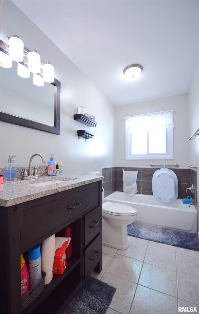2704 Jamison Blvd, Mount Vernon, IL 62864 - bathroom featuring vanity, a bath, tile patterned floors, and toilet