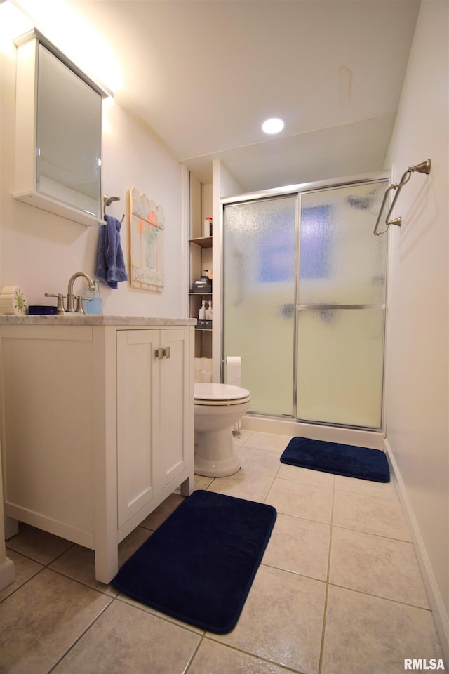 2704 Jamison Blvd, Mount Vernon, IL 62864 - full bath with a stall shower, tile patterned flooring, toilet, vanity, and recessed lighting