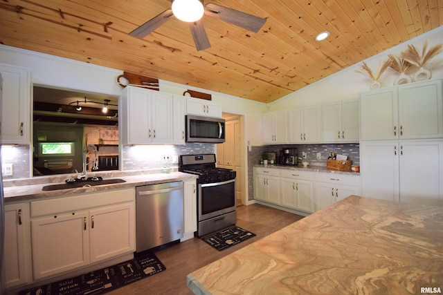 2704 Jamison Blvd, Mount Vernon, IL 62864 - kitchen with appliances with stainless steel finishes, wooden ceiling, lofted ceiling, dark wood-type flooring, and tasteful backsplash