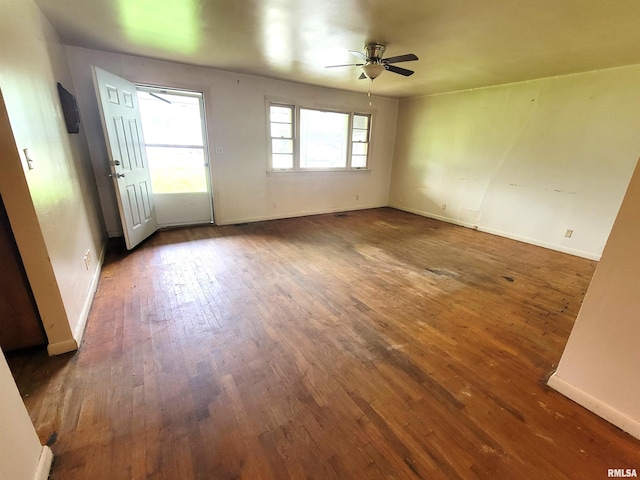 422 E Dr, Flora, IL 62839 - spare room with ceiling fan, hardwood / wood-style flooring, and baseboards