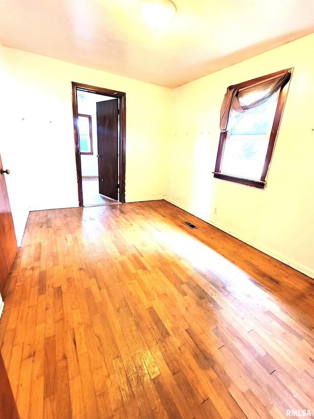 422 E Dr, Flora, IL 62839 - empty room with light wood-type flooring