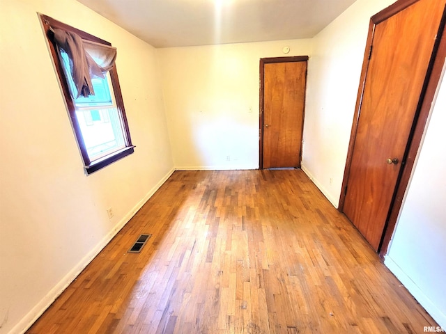 422 E Dr, Flora, IL 62839 - spare room featuring light wood finished floors and baseboards