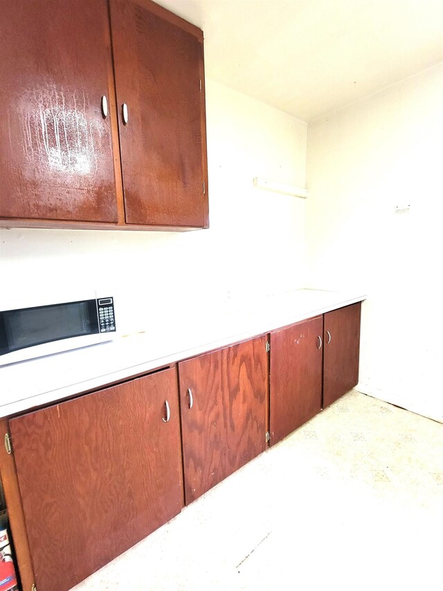 422 E Dr, Flora, IL 62839 - detailed view of white microwave and light countertops