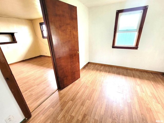 422 E Dr, Flora, IL 62839 - empty room featuring light wood-type flooring and baseboards