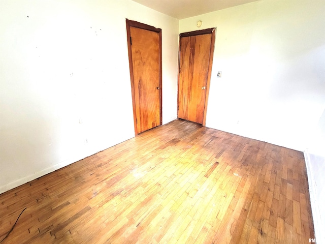 422 E Dr, Flora, IL 62839 - empty room featuring hardwood / wood-style flooring