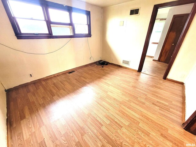 422 E Dr, Flora, IL 62839 - spare room featuring light wood finished floors and baseboards