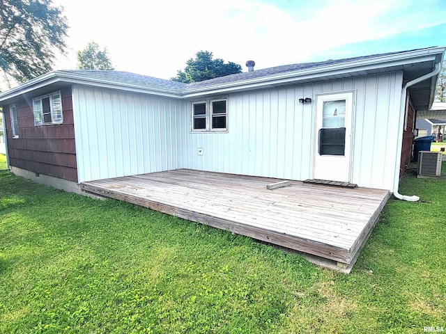 422 E Dr, Flora, IL 62839 - back of property with central AC, a lawn, a deck, and a shingled roof