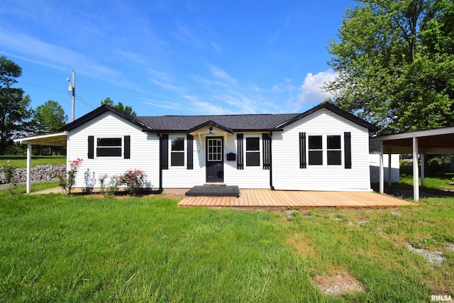 403 S Elm St, Ina, IL 62846 - back of house with a lawn, a wooden deck, and a shingled roof