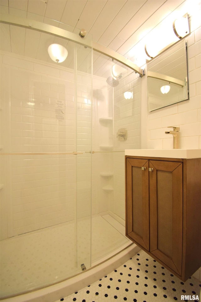 403 S Elm St, Ina, IL 62846 - full bath with a stall shower, vanity, and tile patterned floors