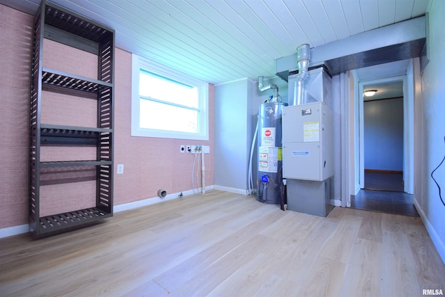 403 S Elm St, Ina, IL 62846 - utility room featuring water heater and heating unit