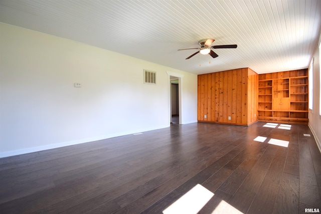 403 S Elm St, Ina, IL 62846 - unfurnished living room with a ceiling fan, dark wood finished floors, built in features, and baseboards