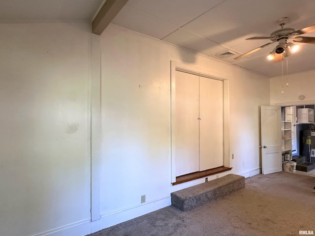 504 S James St, Carbondale, IL 62901 - unfurnished living room featuring ceiling fan, carpet flooring, and baseboards