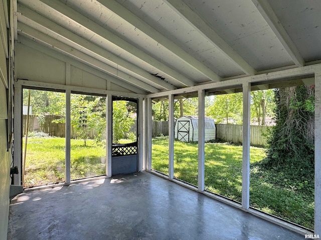 504 S James St, Carbondale, IL 62901 - unfurnished sunroom featuring healthy amount of natural light and vaulted ceiling