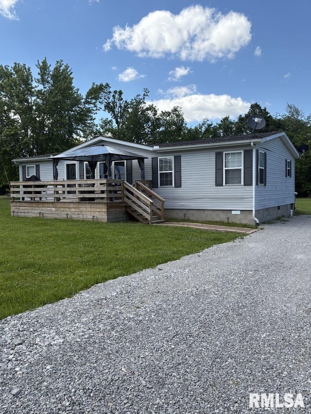 17227 Number 9 Blacktop Blacktop, West Frankfort, IL 62896 - manufactured / mobile home featuring a front yard, crawl space, and a deck