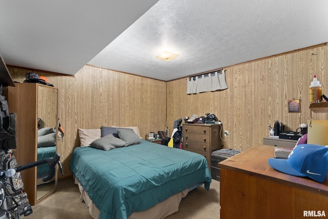 49 Jon St, Metropolis, IL 62960 - carpeted bedroom with wooden walls and a textured ceiling