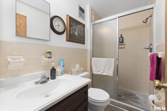 49 Jon St, Metropolis, IL 62960 - full bath featuring a stall shower, toilet, and vanity