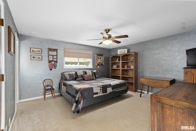 49 Jon St, Metropolis, IL 62960 - bedroom with light carpet, baseboards, and a ceiling fan