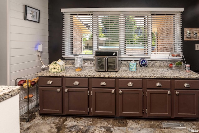 415 E Reichert Dr, Marion, IL 62959 - kitchen with dark brown cabinets and light stone countertops