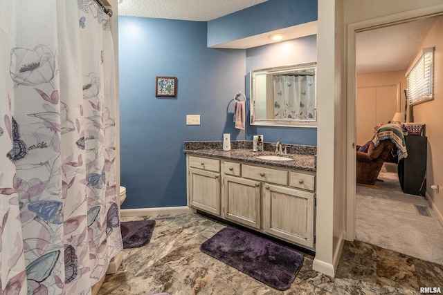 415 E Reichert Dr, Marion, IL 62959 - full bathroom with vanity, baseboards, and toilet