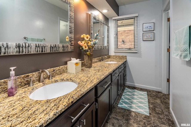 415 E Reichert Dr, Marion, IL 62959 - full bath with baseboards, double vanity, and stone finish flooring