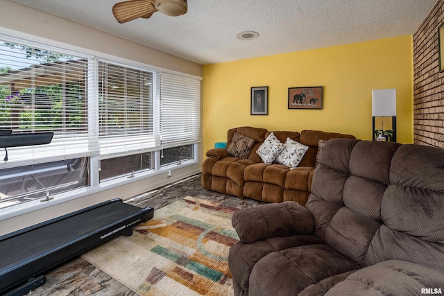 415 E Reichert Dr, Marion, IL 62959 - living room with a textured ceiling, a ceiling fan, and healthy amount of natural light